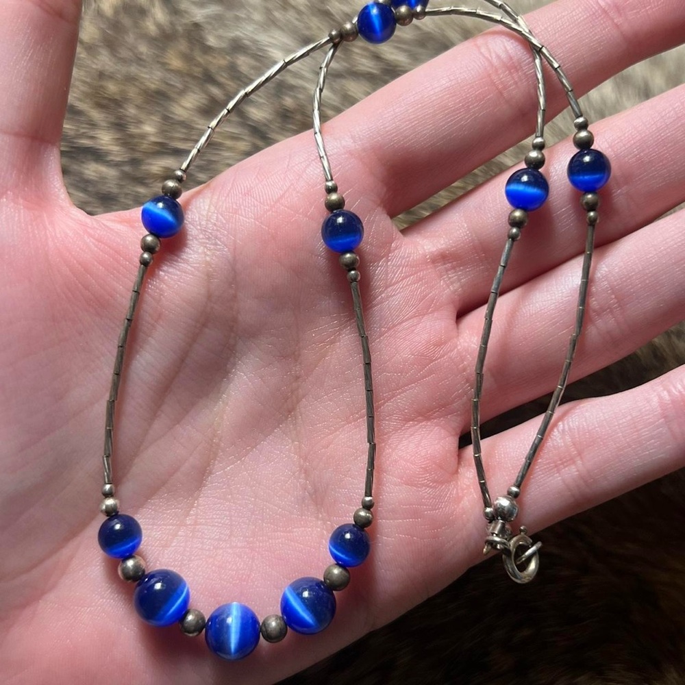 Sterling silver blue optical glass liquid silver necklace